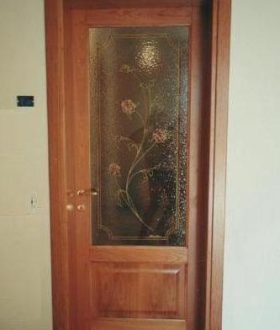 Porte in vetro e legno